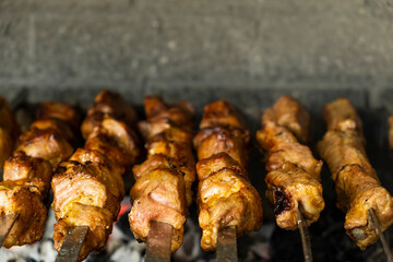 Shish kebab on a skewers. Pork meat on skewers. Copy space
