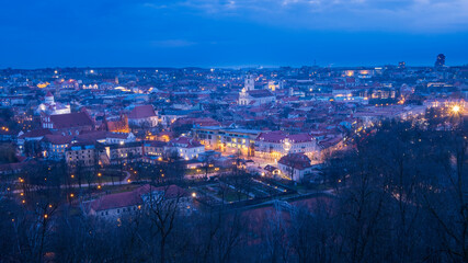 Obraz premium Evening panorama of Vilnius city in Lithuania with night illumination. Top View.
