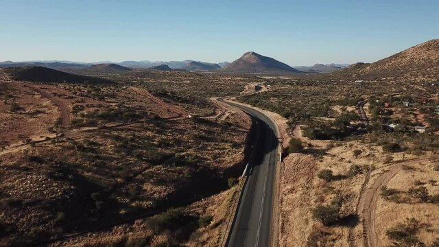 4K aerial drone video of Africa savanna hills, mansions and houses up n the mountains south of Windhoek in central highland Khomas Hochland of Namibia, southern Africa