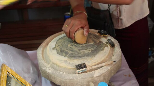 Burmese woman made powder thanaka