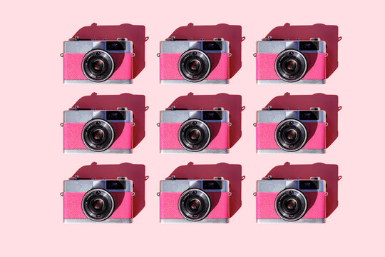 Pattern of rows of vintage analog cameras