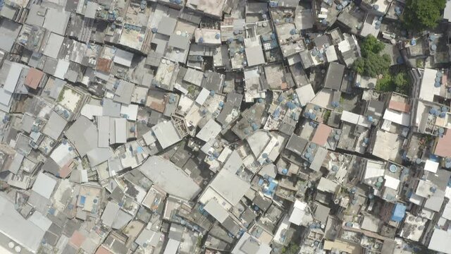 Drone flying over the rooftops of the favela in Rocinha near Sao Conrado in Rio de Janeiro Brazil