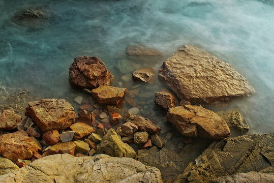 Natural Colorful long exposure detail of rocks and sea in tropical ocean, background or wallpeper