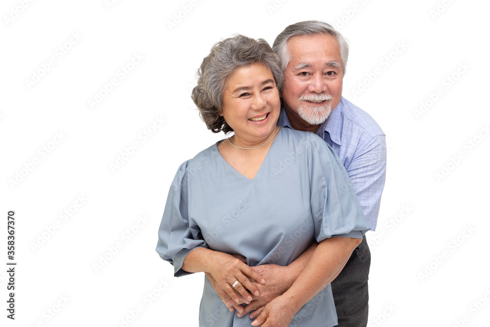 Wall mural asian senior couple hugging together isolated over white background