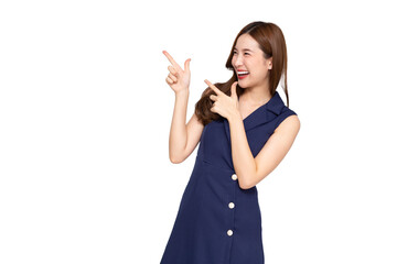 Fototapeta premium Young elegant beautiful Asian woman smiling and pointing to empty copy space isolated on white background