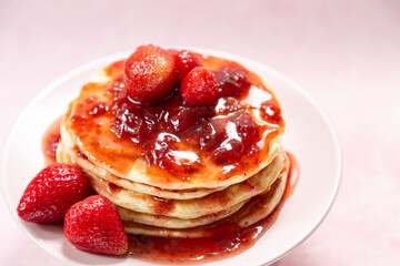 stack of pancakes with syrup