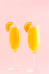 Yellow cocktail on a bright background.
