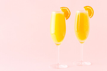 Yellow cocktail on a bright background.