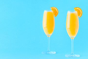 Yellow cocktail on a bright background.
