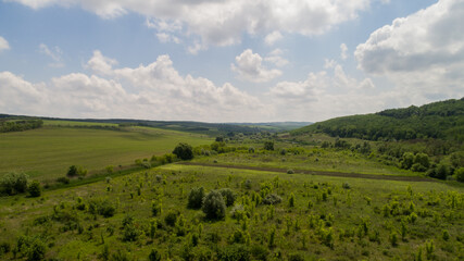 Beautiful view of the hills from a height against a background of white clouds