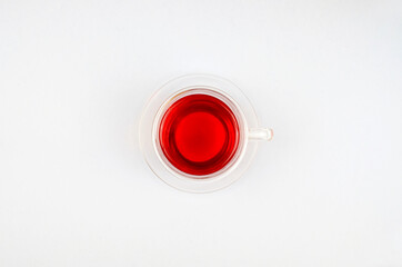 glass cup of tea top view on light background