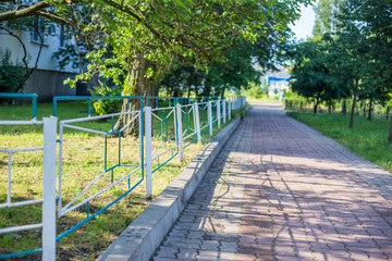 Old abandoned fence on the street