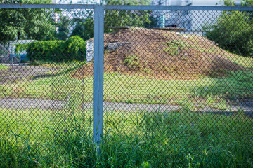 Old abandoned fence on the street