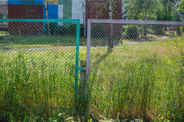 Old abandoned fence on the street