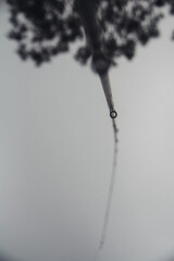 Close-up fishing rod and fishing line is threaded through the rings