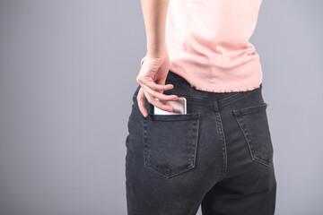 phone on woman jeans pocket