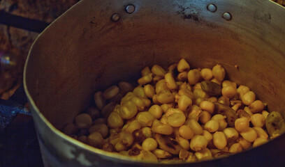 shelled corn and cooked in the pot