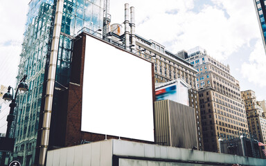 Publicity mock up area for advertising or commercial information Lightbox on exterior of modern buildings in downtown,blank billboards with copy space on skyscraper facade in business district of city