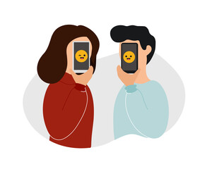 Woman and man holding phones with emoji