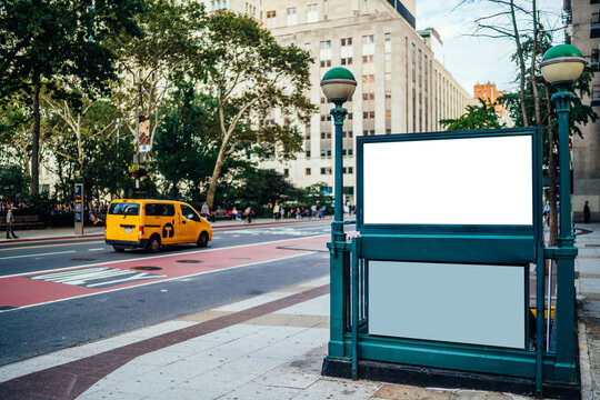 New York City Subway entrance with Clear empty billboard with copy space area for advertising text message or content, public metro transportation information board, promotional mock up on city street