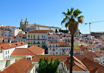 View of Lisbon old town from the viewpoint called "Miradouro Portas do Sol" in Portuguese