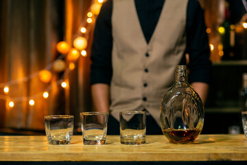 Barman pouring whiskey whiskey glass beautiful night