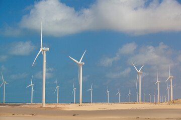 
wind power plant antennas in the dunes of Canoa Quebrada, Ceará, Brazil