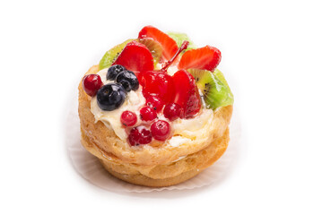 Home made cake with cream and fruits isolated.