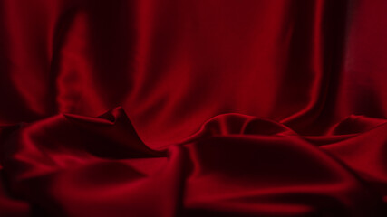 Red silk or satin luxury fabric texture can use as abstract background.