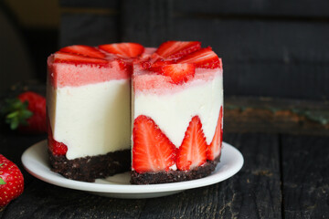 cheesecake strawberrie, sweet mascarpone dessert cake with berries Menu concept healthy eating  food background top view copy space keto or paleo diet