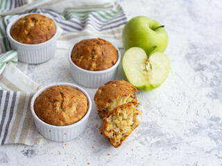 Muffin with cheese and apple. Fresh homemade cakes. Maasdam. Concept of healthy breakfast. Close up. Copy space.