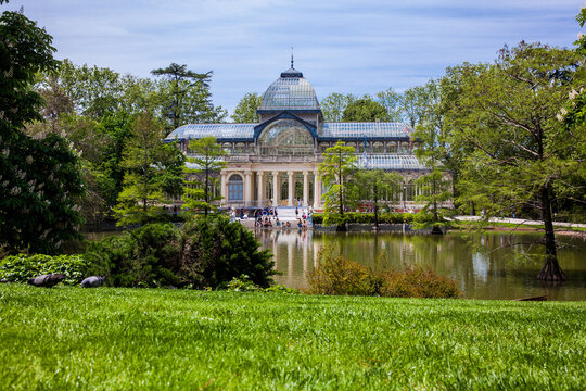 View of the beautiful Palacio de Cristal a conservatory located in El Retiro Park built in 1887 in Madrid