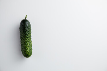 Cucumber on a white background. Minimum concept. Top view