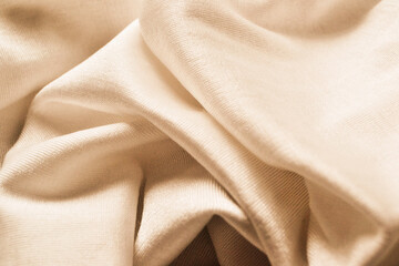 Silky organic cotton fabric with wavy texture.