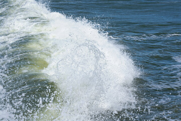a big wave on the Baltic sea coast during a storm