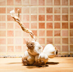 Garlic bulbs in rustic kitchen