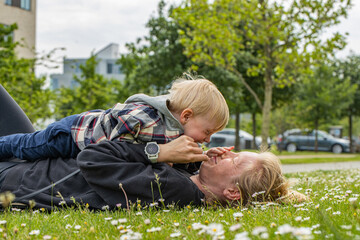 kid playing with his mom