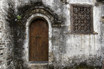 Fototapeta na wymiar Door and window on old house in Xingping, Guangxi, China