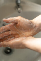Fototapeta premium man washing hands