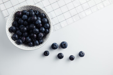 Close-up of blueberries on a wooden Board. Fresh berries
