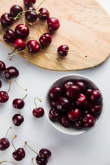 Close-up of a cherry tree on a wooden Board. Fresh berries