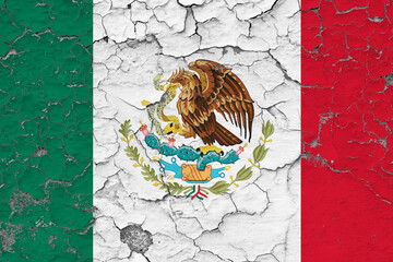 Mexico flag close up grungy, damaged and weathered on wall peeling off paint to see inside surface. Vintage concept.