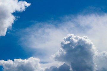 Naklejka na ściany i meble A beautiful cloud in the shape of a ram’s head against a blue sky