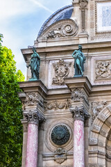 Sculpture of ancient Paris Fountain Saint-Michel at Place Saint-Michel. France. Fountain Saint-Michel constructed in 1858 - 1860 during French Second Empire. Paris, France. 