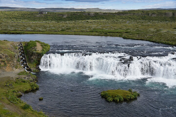 On Iceland's Golden Circle, near Skalholt, a fish ladder helps spawning salmon bypass Faxi Falls on the Tungufljot River.