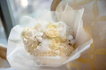 beautiful white bouquet of delicate natural flowers of roses