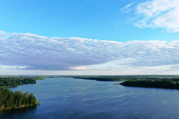 natural landscape with river forest and fantastic clouds in the sky