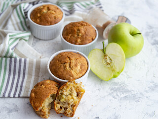 Muffin with cheese and apple. Fresh homemade cakes. Maasdam. Concept of healthy breakfast. Close up. Copy space.