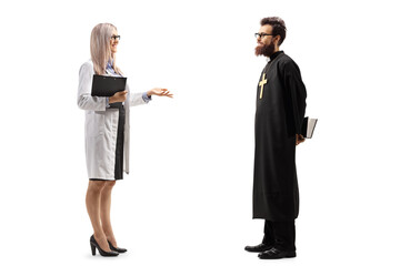 Female doctor talking to a priest