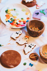 Handmade gingerbread cookies in the form of ghosts. halloween background 